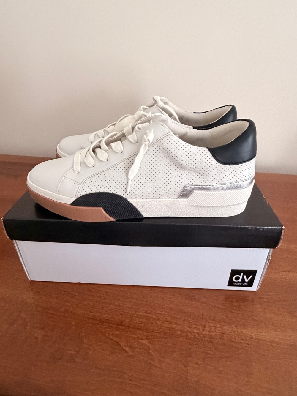 DV by Dolce Vita White Low-Top Casual Sneakers with Black Heel Accent